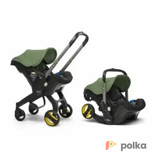 Возьмите Коляска-автокресло (автолюлька) Doona+ (0-13 кг) (хаки) напрокат (Фото 1) в Москве